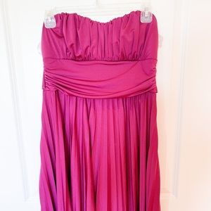 Never worn orchid purple strapless dress with pleat skirt at knee size l